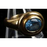 An 18ct gold and topaz dress ring