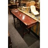 A Chinese alter table, rosewood finish, scroll ends, pierced 'Greek' key apron, block legs with