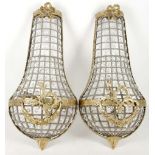 A pair of brass and rigid wire wall lights with glass buttons (2)