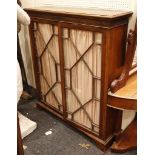 An Edwardian mahogany dwarf bookcase, with twin gl