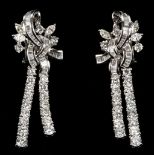 A pair of 18ct white gold and diamond set tassel earrings