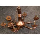 A 1970's TEAK AND COPPER CHANDELIER.