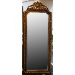 A large mirror with an ornate gilded frame in the French style, 190 x 76cm (with frame)