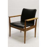 FINN JUHL for FRANCE & SONS DENMARK, a 1960's DIPLOMAT armchair, teak frame with black faux leather,