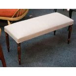 A pair of duet stools with rectangular upholsterd top, raised on circular section, reeded,