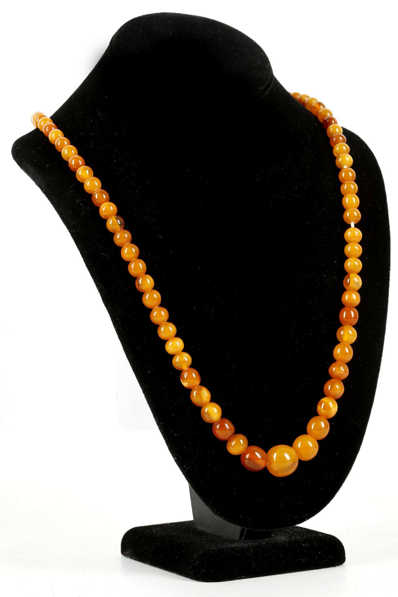 An amber necklace, 70cm string of graduated beads - Image 2 of 2