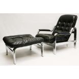 A 1970's KNOLL ASSOCIATES ARMCHAIR and FOOTSTOOL, black leather and chrome with adjustable reclining