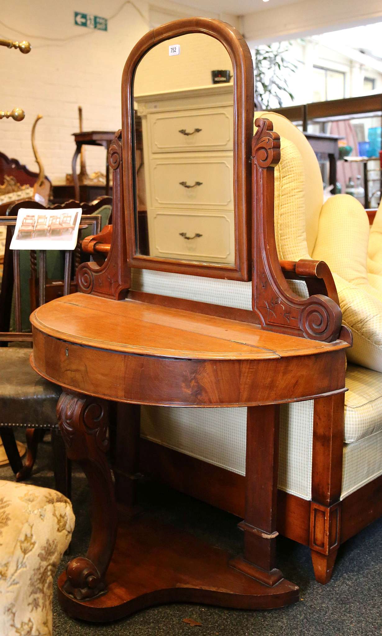 A late 19th Cerntury, Duchess hall table, mahogany, arch mirror with carved supports, lift up