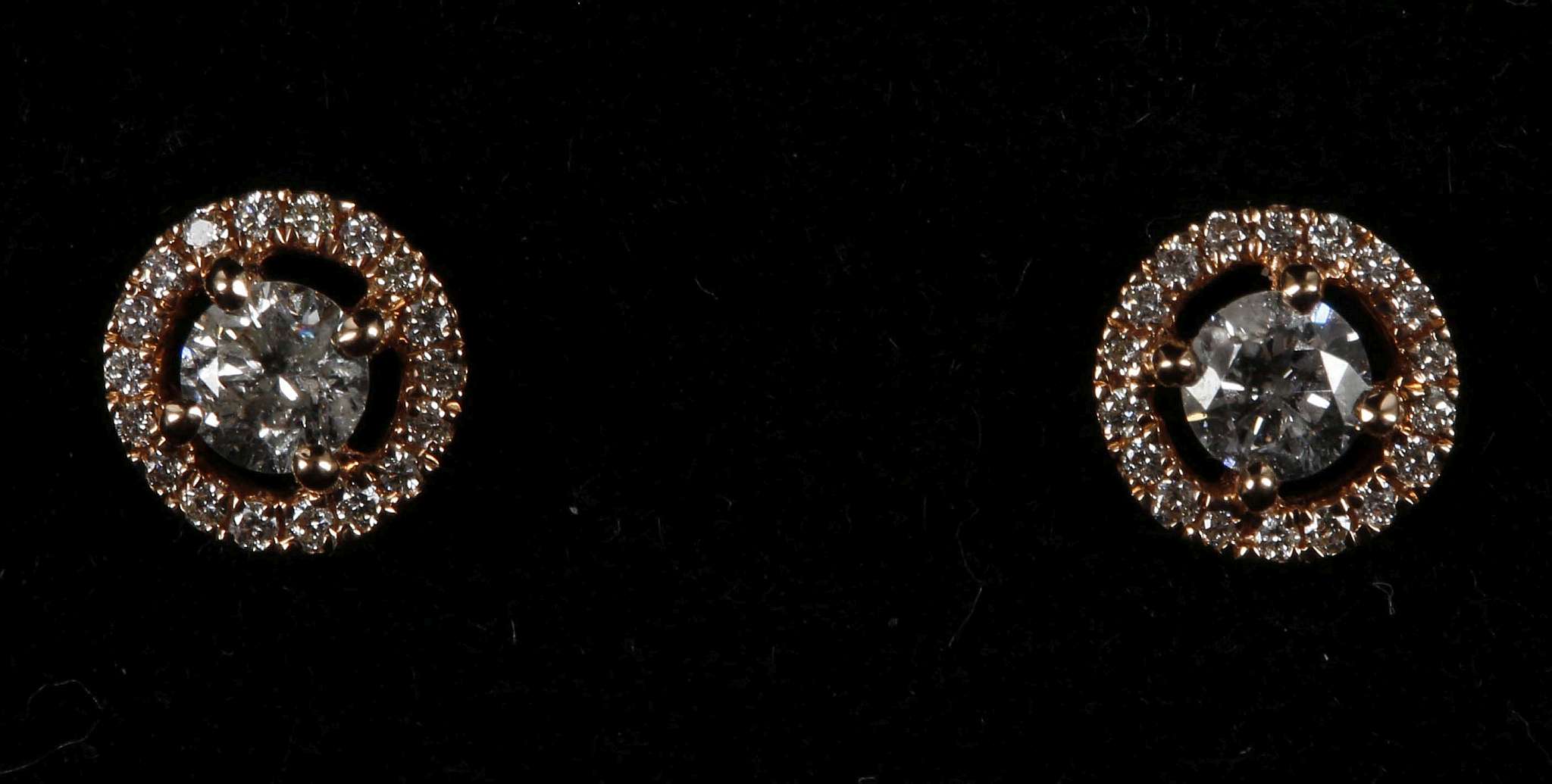 An 18ct rose gold pair of multi cluster diamond stud earrings, 0.41ct