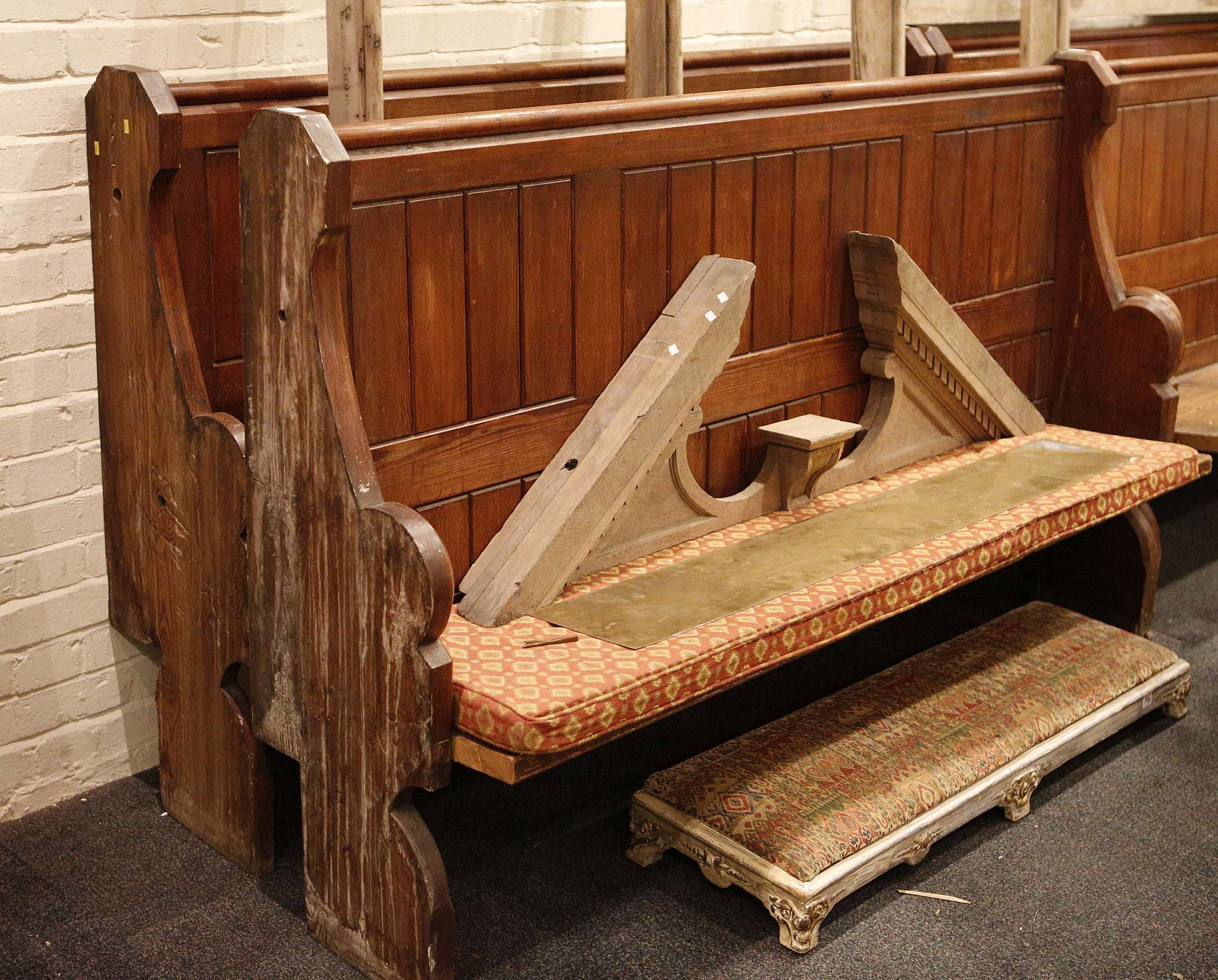 A pair of late Victorian pine settees with squab c