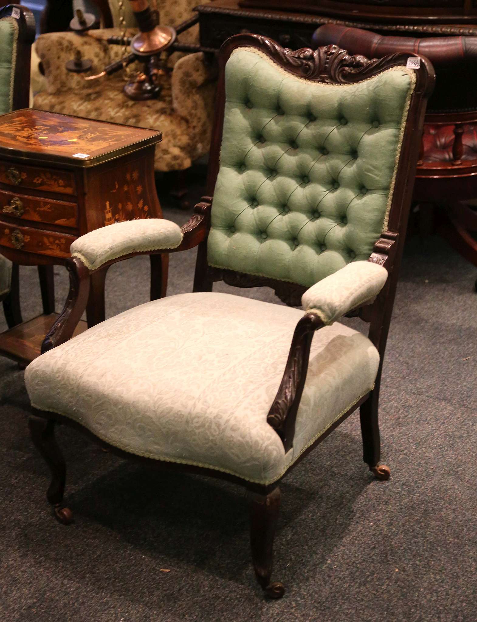 A pair of his and hers armchairs, mahogany frame, with leaf carving, button back, padded arms, - Image 2 of 2