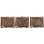 A RARE SET OF LOUIS VUITTON LUGGAGE, three large wheeled Pullman cases, 1990s, monogram canvas