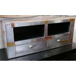 An aluminium and copper patch television stand with two draws and two open storage ares, 120 x 48