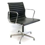 A CHARLES EAMES EA108 CHAIR, manufactured by ICF, black leather with aluminium frame, on four star