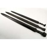 3 Chinese bronze swords; snake handle, 51cm blade; mask handle, 50.5cm blade; disk handle, 43.5cm