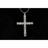 An 18ct white gold large diamond cross, 3.80ct on 18ct white gold snake chain