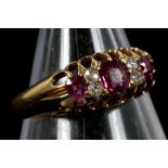 A Victorian 18ct gold, ruby and diamond set ring
