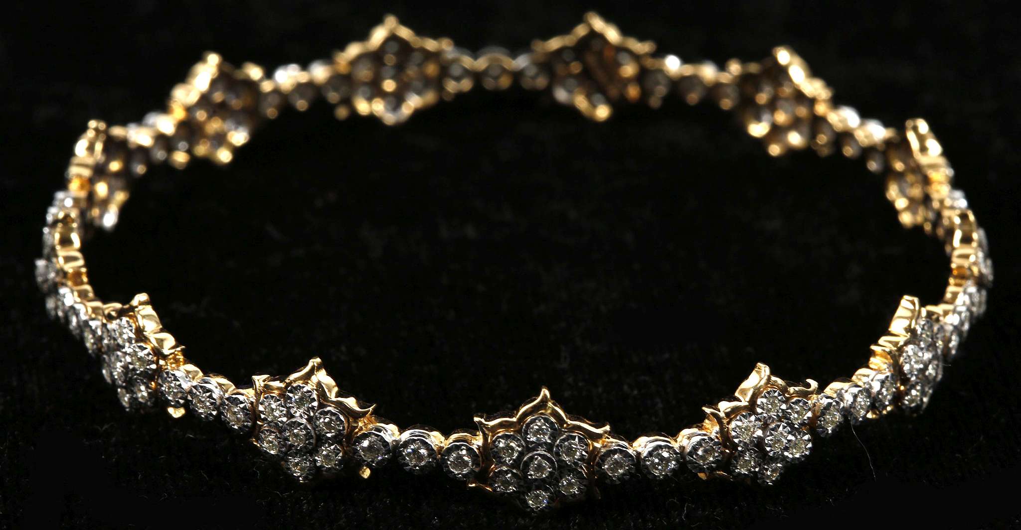 18ct yellow gold and diamond cluster bangle