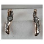 A 14ct rose gold and diamond set of hinged hoop earrings