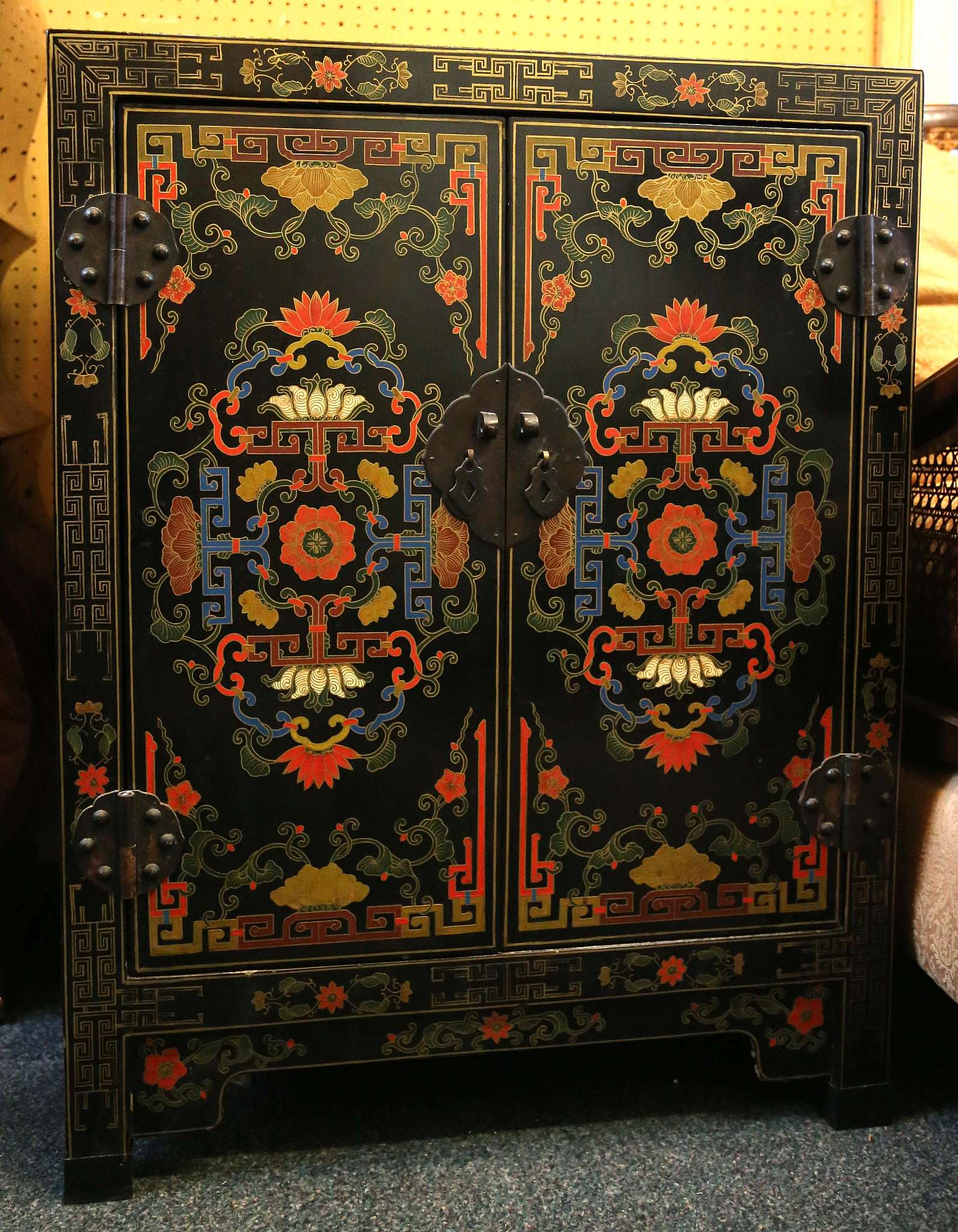 A pair of Chinese lacquer cabinets, with all over