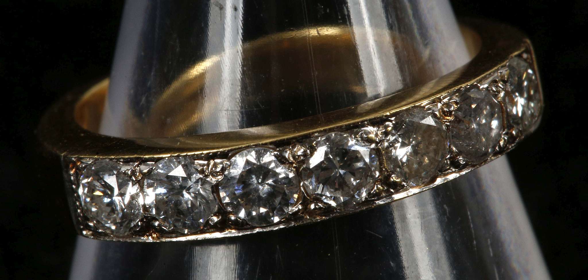 An 18ct gold and diamond seven stone ring