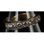 An 18ct gold and diamond seven stone ring