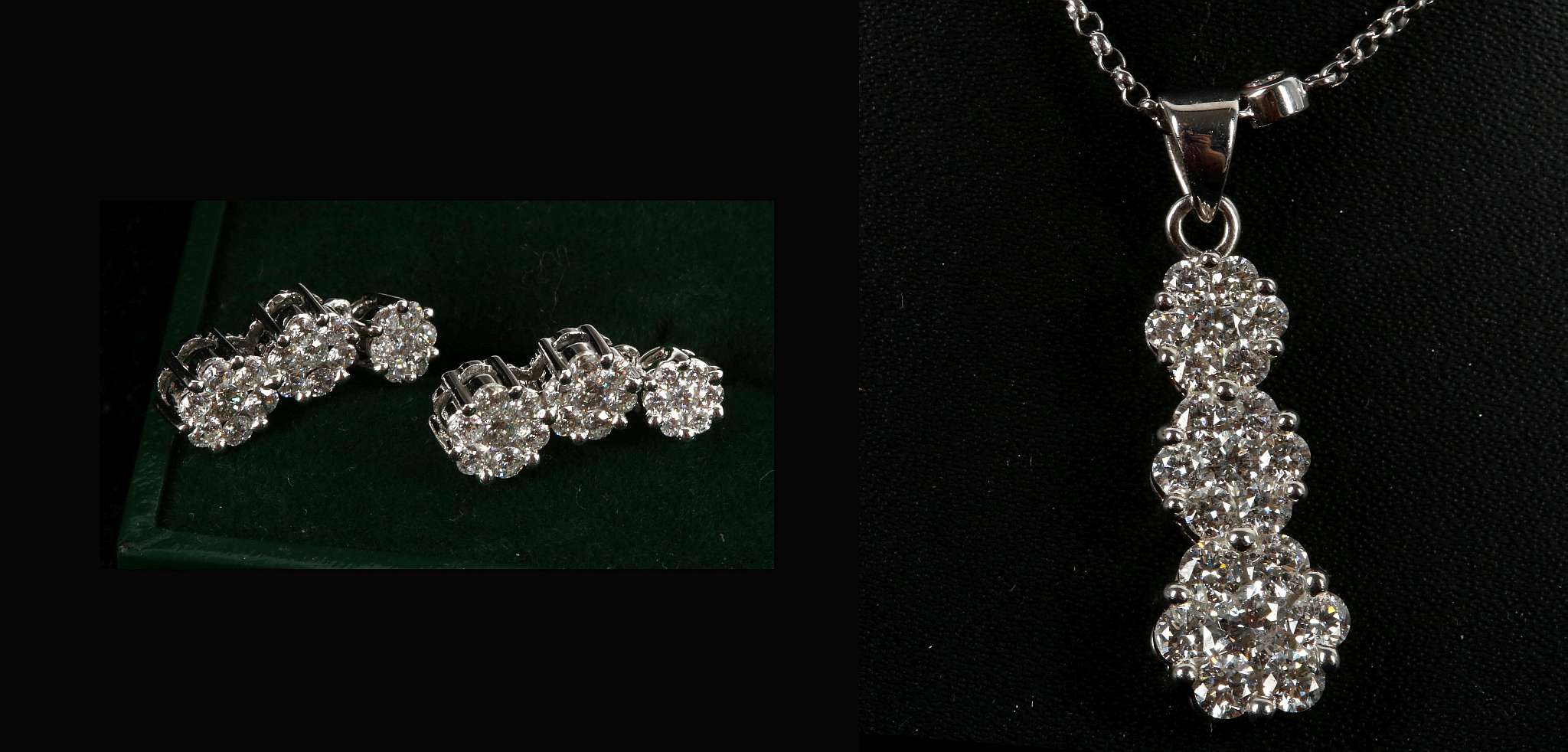 An 18ct white gold and diamond set, graduated triple cluster pendant, with diamond set chain and