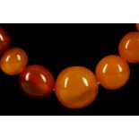 An amber necklace, 70cm string of graduated beads