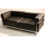 LE CORBUSIER LC3 2 SEATER SOFA, black leather cushions supported by chrome frame, late 20th century,