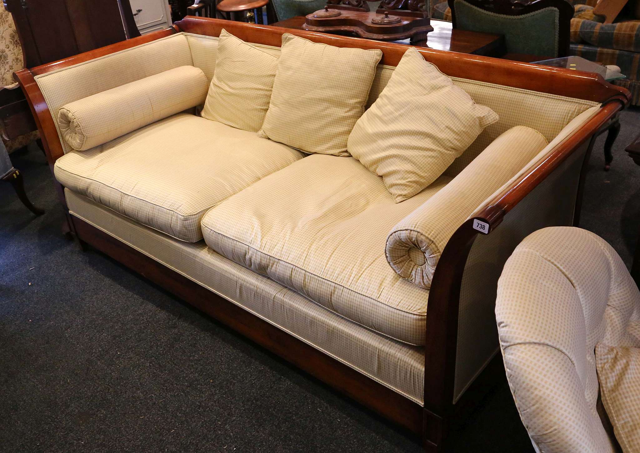 A modern, French, beechwood framed, two seater sofa, upholstered in yellow silk