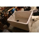 A ceramic butlers sink