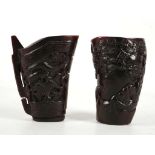 A near pair of Chinese drinking vessels, libation cups, decorated with dragons and scholars