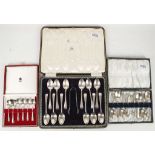 3 Silver boxed sets of cutlery; bright cut 12 place teaspoons and sugar nips, Sheffield 1912,