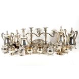 A pair of twin arm tri-pot candelabra, tea and coffee pots and other tableware including silver