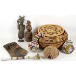 A collection of African figures, basket and a musical instrument