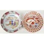 Two Chinese plates, 19th Century, one painted with oriental figures in a landscape setting, the