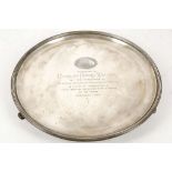 A hallmarked silver salver on 3 feet, 30cm diamete