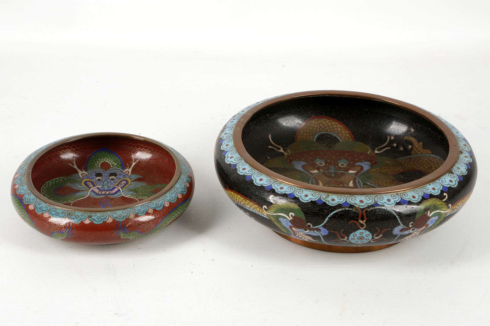 Cloisonné, two dragon decorated bowls, one bearing
