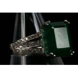 A 18ct white gold, large emerald ring, 7.06ct, the