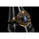 An 18ct gold, sapphire and diamond cluster ring