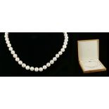 A cultured pearl necklace, with silver barrel clas