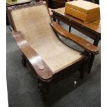 A 19th Century colonial hardwood planters armchair
