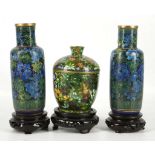 A pair of cloisonné cylinder stem vases, with flor