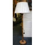 A 20th Century, beech and ebonised standard lamp,