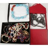 A quantity of costume jewellery, including boxed e