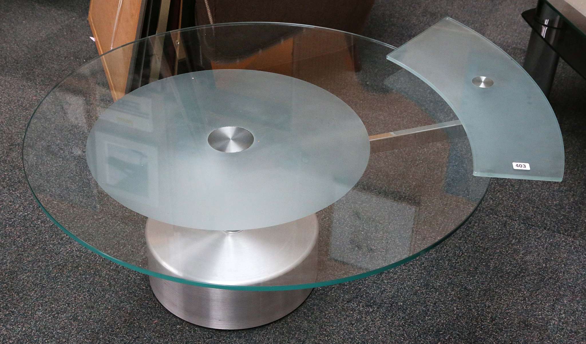 A contemporary coffee / display table, blue froste