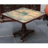 A 19th Century rosewood fold over cared table on a