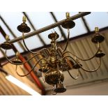 A pair of Dutch style, brass, 8 arm light chandeli