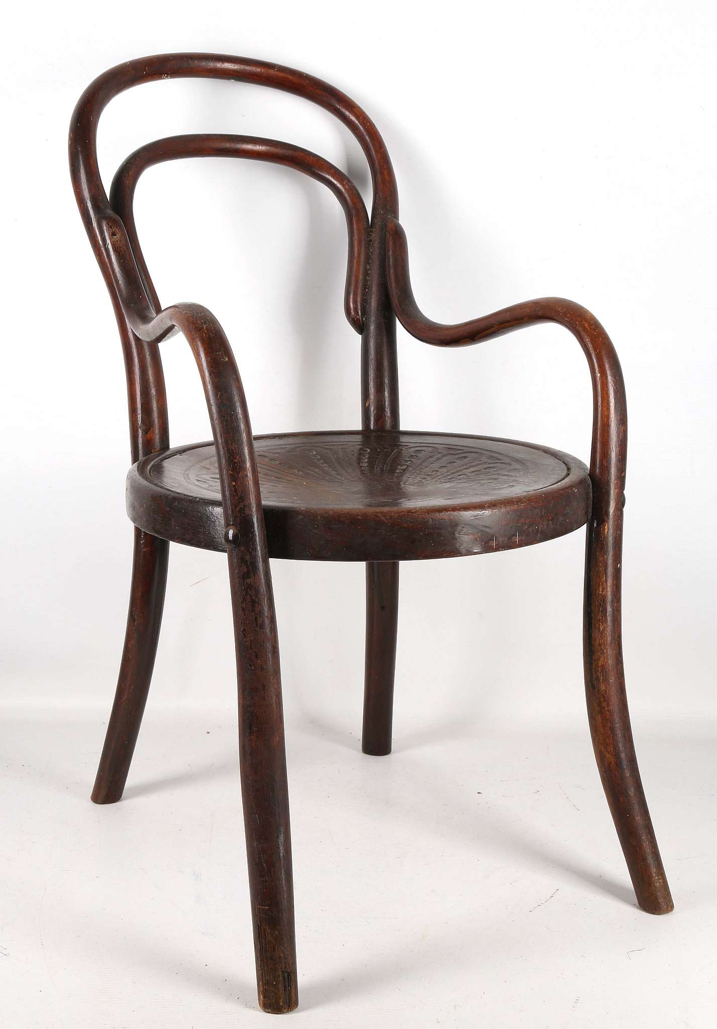 A Thonet child's bentwood chair, arms, fan decorat