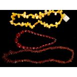 A Russian, honey amber bead necklace, together wit